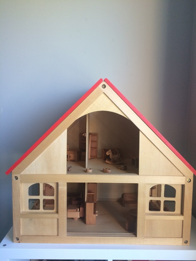wooden dollhouse red roof